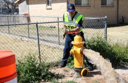 Los Lunas Firefighter Flushing Fire Hydrant